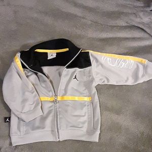 Kids Jordan lightweight jacket or top.